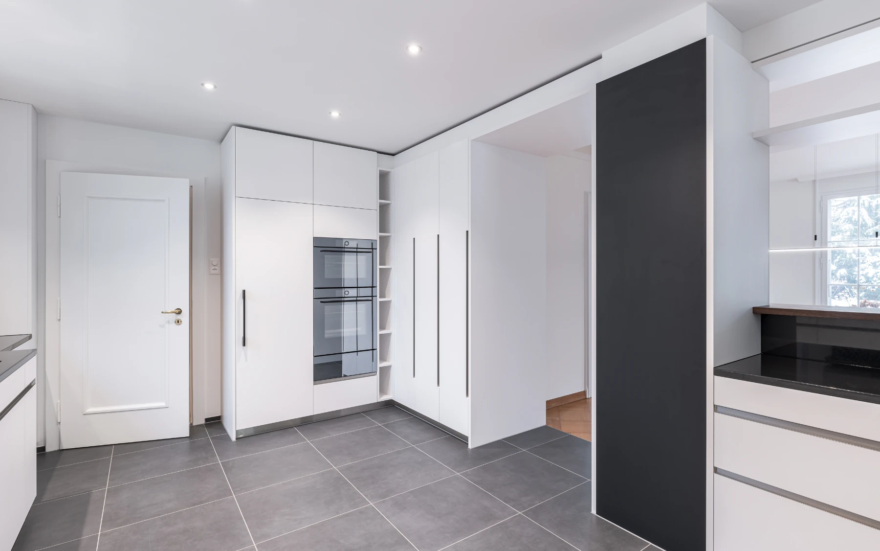 Wohnraum und Küche bilden eine Einheit.